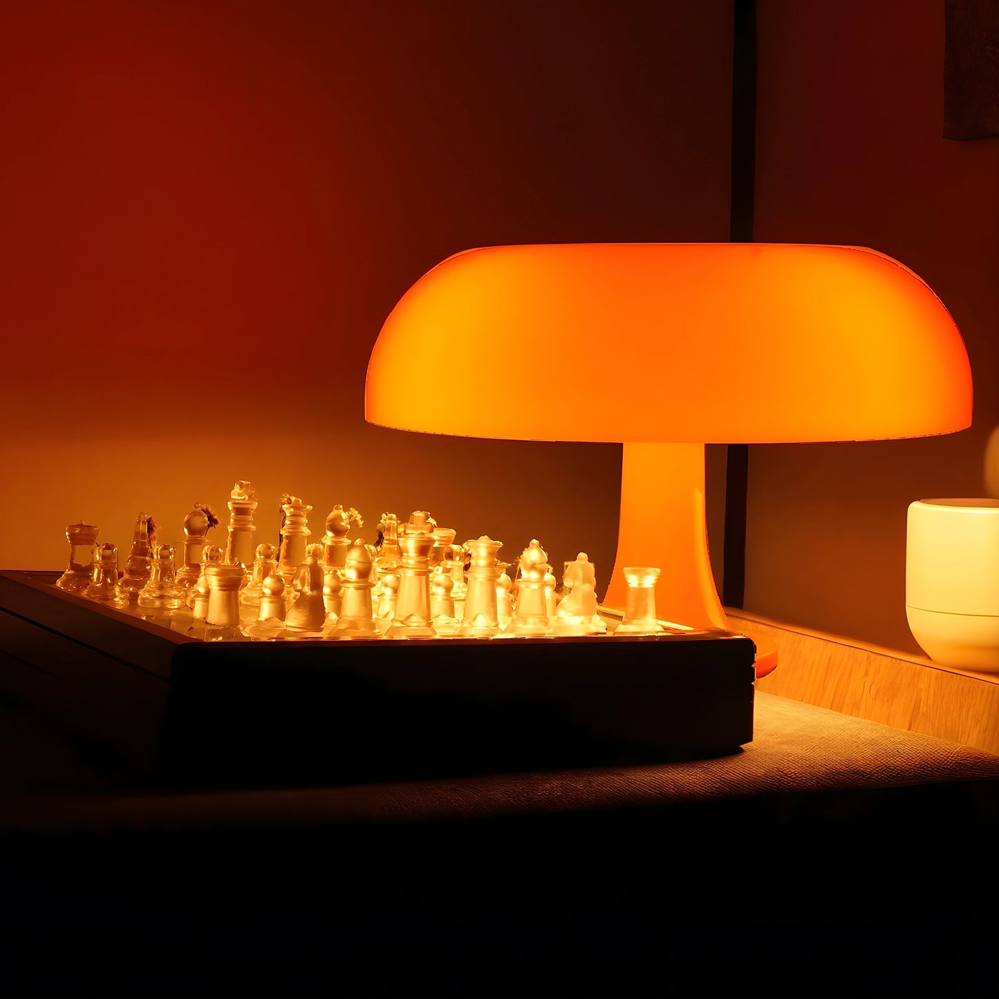 View of a contemporary sculpted acrylic mushroom table lamp featuring a translucent white shade and a smooth, rounded base