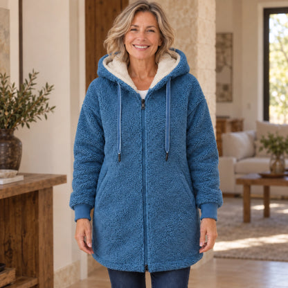 fleece jacket — Audrey Blue complete front view, worn by a joyful smiling adult model age 50 in real setting — view 2