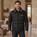 fleece jacket — Mason Black complete front view, worn by a joyful smiling adult model age 30 in real setting