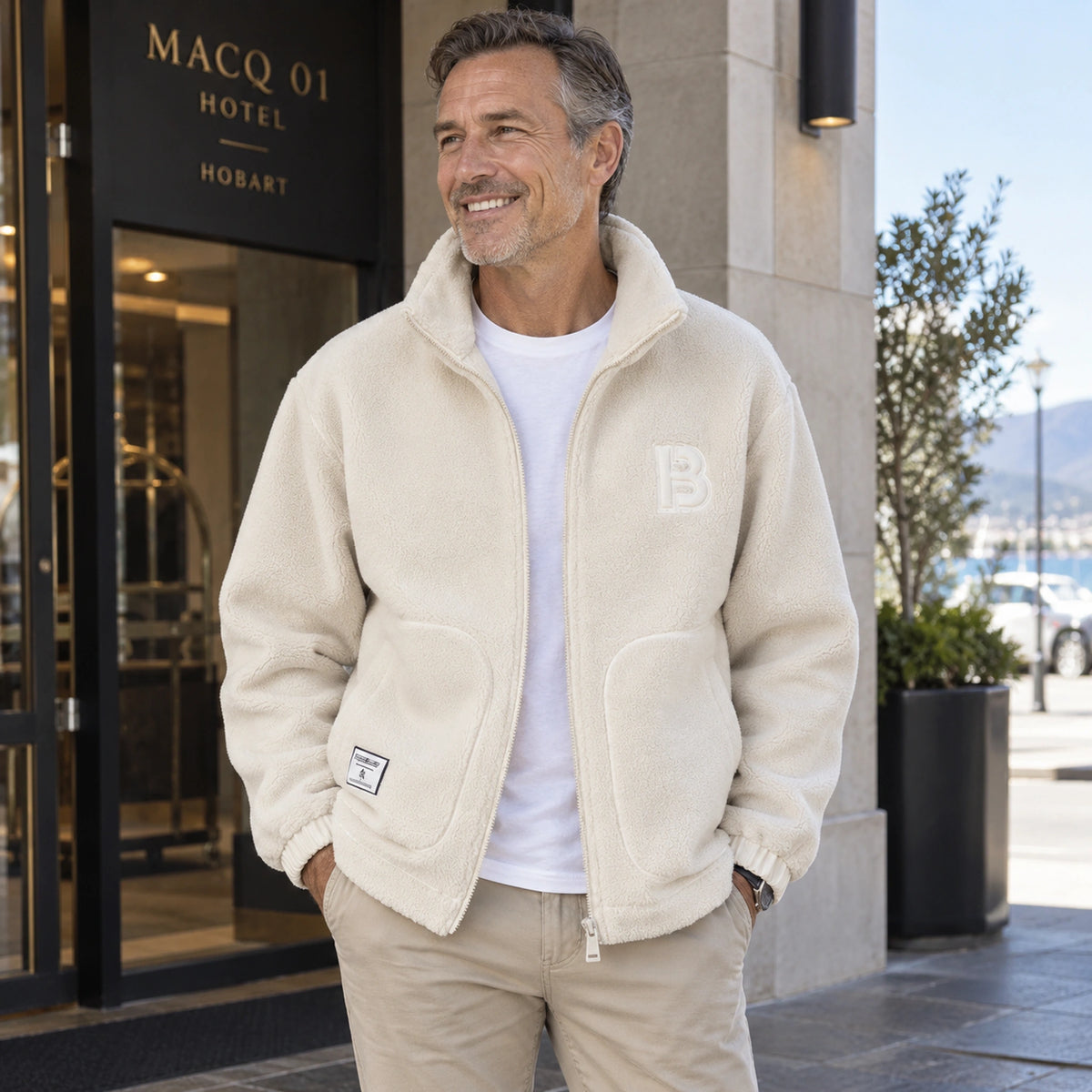 Milan Beige textured fleece jacket worn open in natural Australian spring light. — view 5