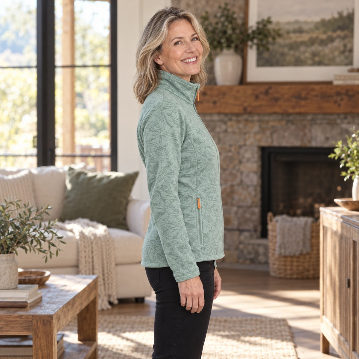 fleece jacket — Violet Light Green side worn by an adult model in a realistic setting, complete garment visible — view 6