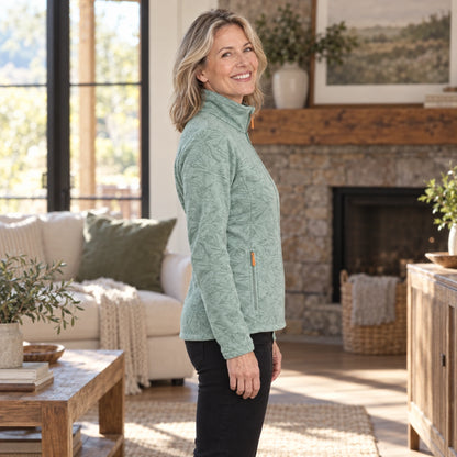 fleece jacket — Violet Light Green side worn by an adult model in a realistic setting, complete garment visible — view 6