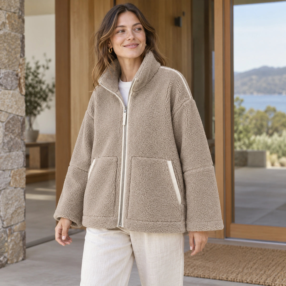 Khaki Avalon fleece jacket, front three quarter view on young model — view 3