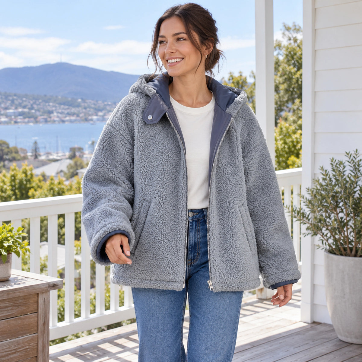 fleece jacket — Blue Freya jacket worn with grey teddy fleece side outward, three quarter front view on young model — view 3