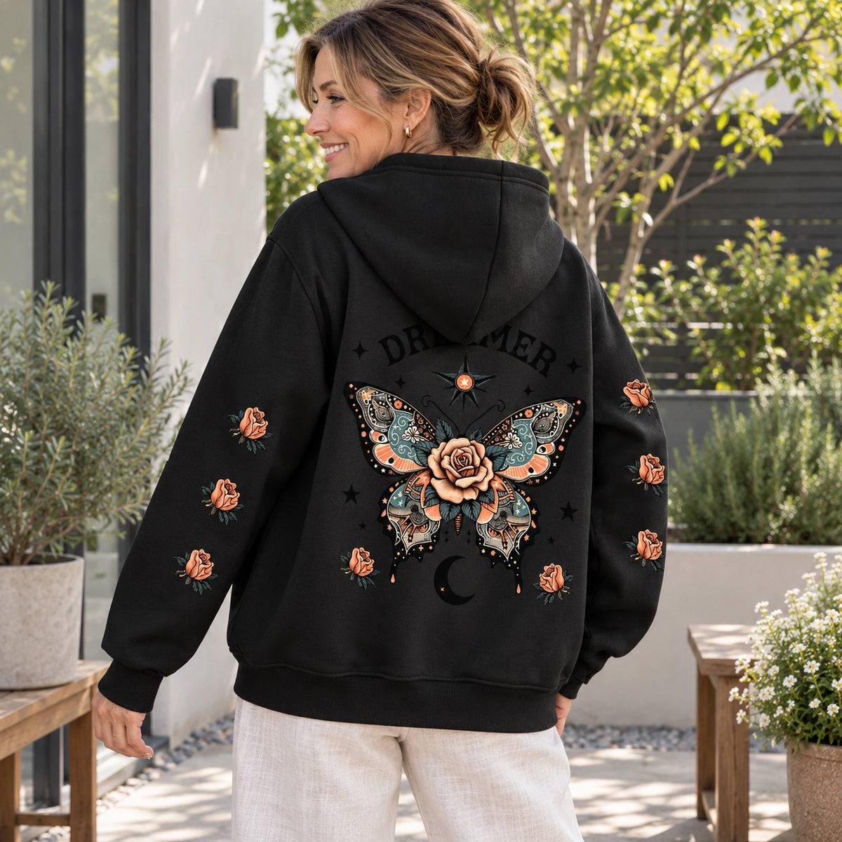 Black butterfly and rose print hoodie, complete rear view showing the artwork — view 2