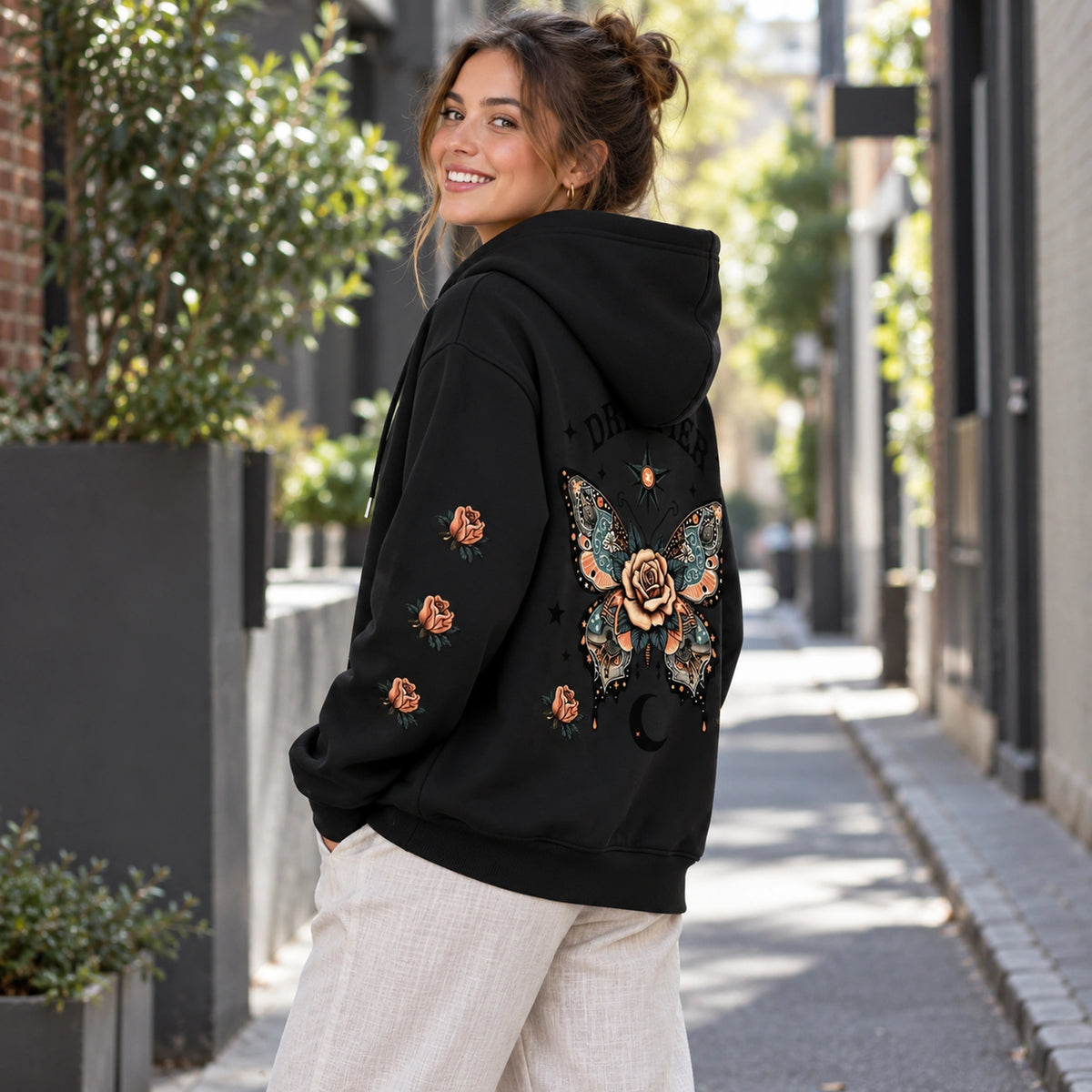 Black butterfly and rose print hoodie, complete profile view — view 6