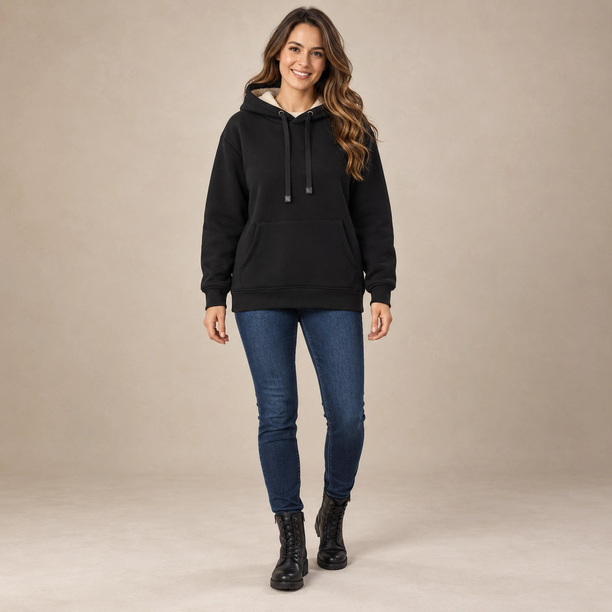 Women's Fleece Lined Pullover Hoodie — Lilly, Black, complete front view, worn by an adult model, professional image