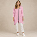 Shaly Pink longline zip up hoodie front image, complete garment on a happy female model.
