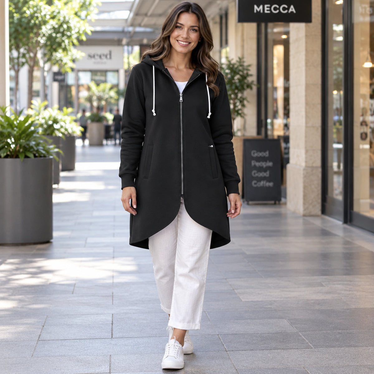 Shaly Black longline zip up hoodie front color image, complete garment on a happy female model. — view 3