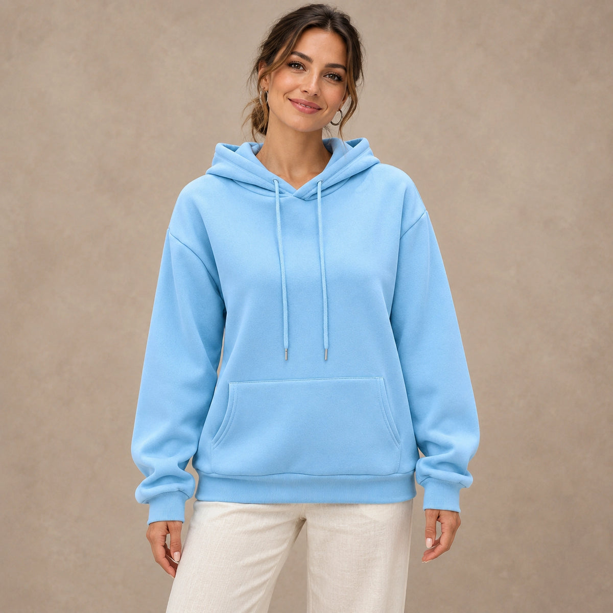 Blue Lilac pullover hoodie, complete front view on young model in warm neutral