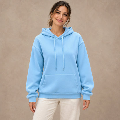 Blue Lilac pullover hoodie, complete front view on young model in warm neutral