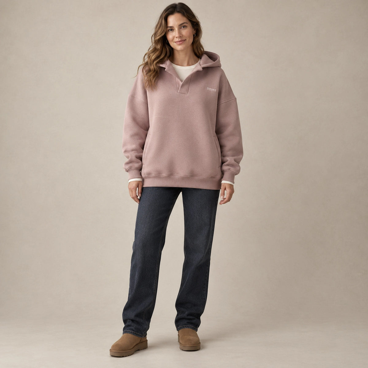 Women's Split Neck Pullover Hoodie — Paulina, Dusty Rose, complete front view, worn by an adult model, professional image