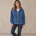 Women's Textured Chest Pocket Zip Up Hoodie — Noemi, Blue, complete front view, worn by an adult model, professional image