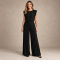 jumpsuit — Image; full front view; Black; complete product worn by a happy adult model