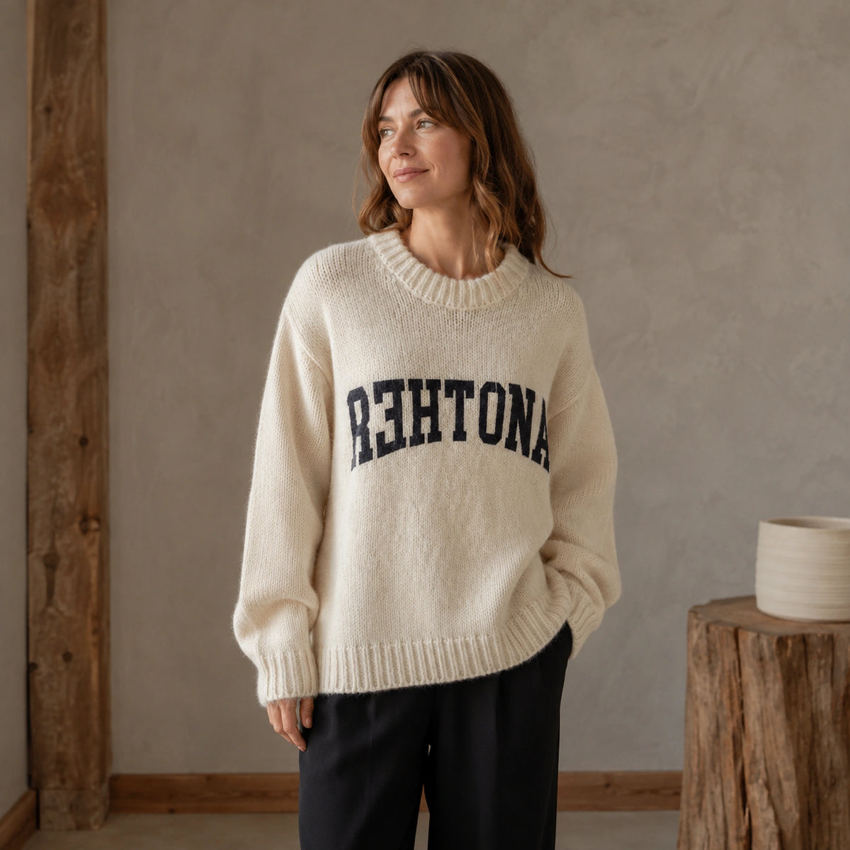 Woman wearing ivory white collegiate letter letterman sweater, complete front view — view 3
