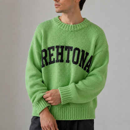 Close up of green collegiate letter letterman sweater knit and ribbed cuffs — view 7