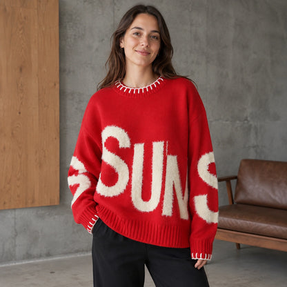 Woman wearing red fuzzy letter pattern letterman sweater, complete front view — view 3