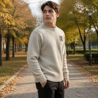 Male model wearing men's khaki fleece lined patch letterman sweater, complete side view — view 5