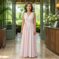 long wedding guest dress — Pale pink sleeveless wrap maxi wedding guest dress complete front view