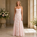 long wedding guest dress — Pink floral lace bustier maxi wedding guest dress on a mature woman