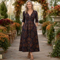 long wedding guest dress — Navy Rust Botanical front