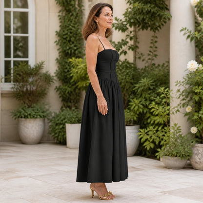 long wedding guest dress — Black corset midi wedding guest dress true side profile — view 9