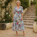 long wedding guest dress — Multicolor botanical floral puff sleeve wedding guest dress complete front view