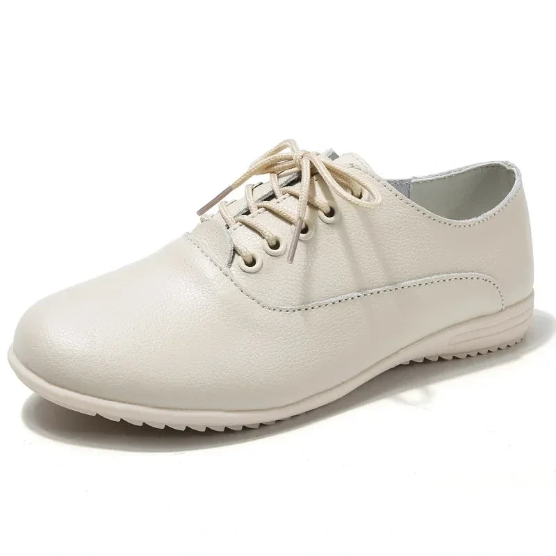 Comfortable beige marching band shoes with lace up design and textured sole — view 6 — view 5