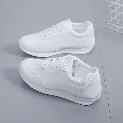 White marching band shoes with lace up design and cushioned sole, side view — 6 — view 5