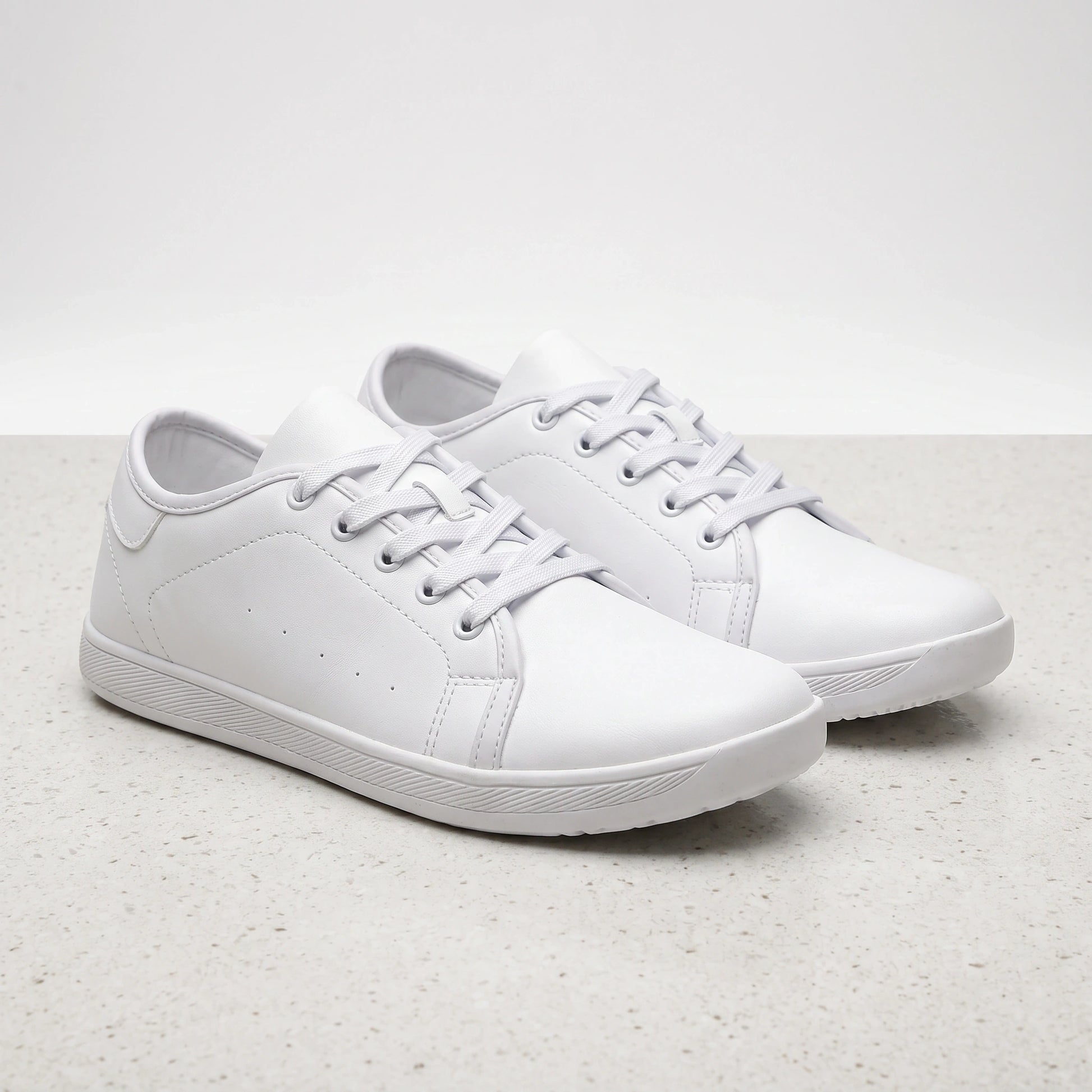 Close up view showing the soft leather texture and precise stitching of Comfortable Wide Toe Marching Band Shoes, their