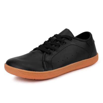 Marching band shoes — Black shoe with wide toe and tan sole, angled view — 7 — view 3