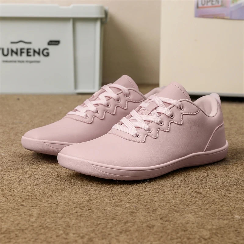 Comfortable wide fit marching band shoes in light pink with lace up design on carpeted floor — view 14 — view 12