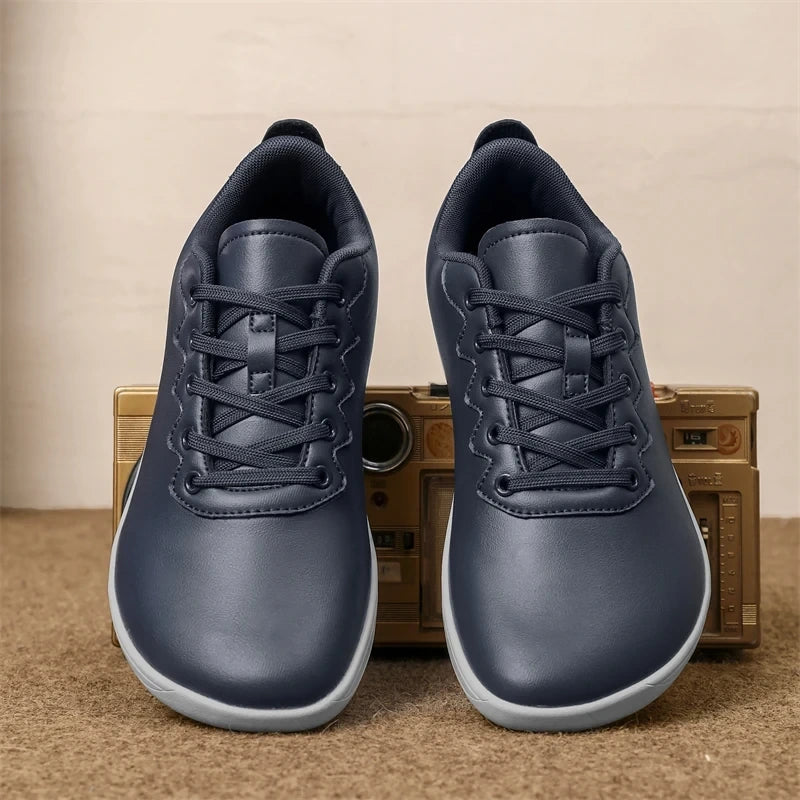 Dark blue marching band shoes with lace up design and cushioned soles, front view — 4 — view 3