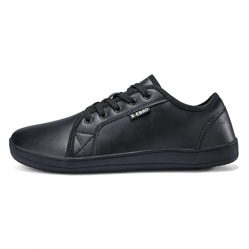 Black marching band shoes with wide toe design and lace up closure, side view — 9 — view 4