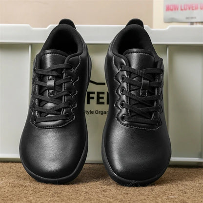 Black breathable wide toe marching band shoes with lace up design, front view — view 2