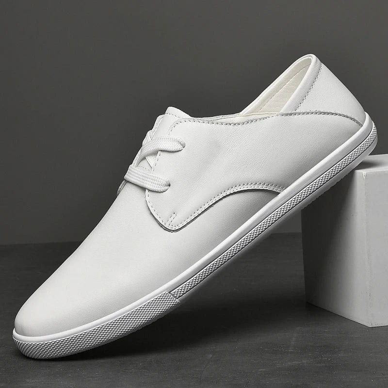 White marching band shoes with laces, breathable design, elevated on a gray surface — view 8 — view 7