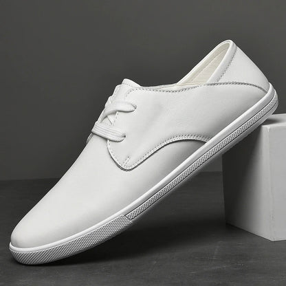White marching band shoes with laces, breathable design, elevated on a gray surface — view 8 — view 7