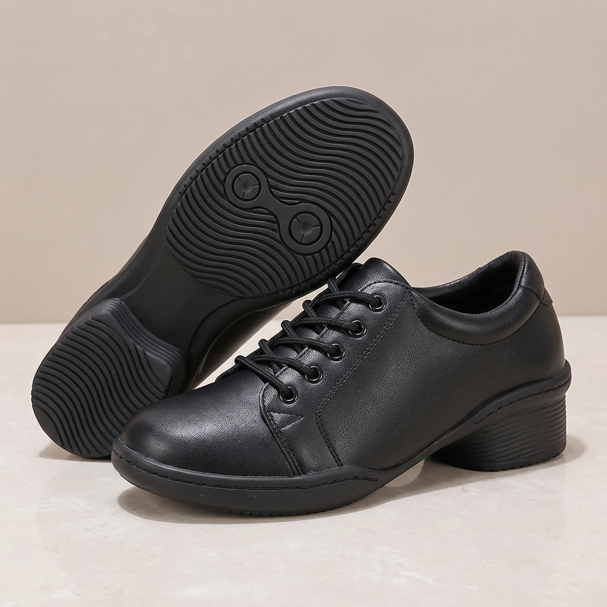 Close up of the soft leather texture and precise stitching on comfortable marching band shoes, showing their quality