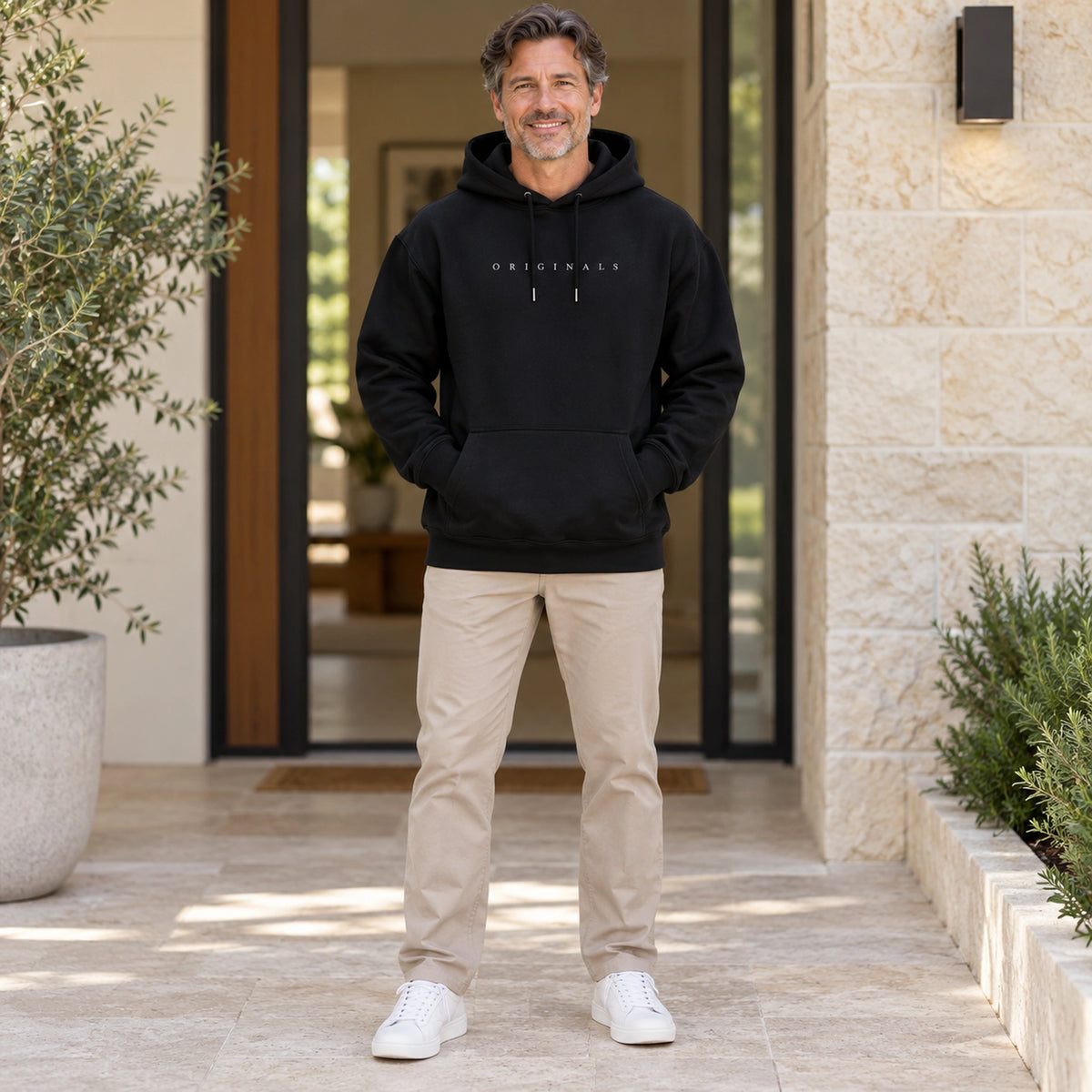 mens hoodie — Noah Black hoodie front color image on happy mature male model, complete garment — view 2
