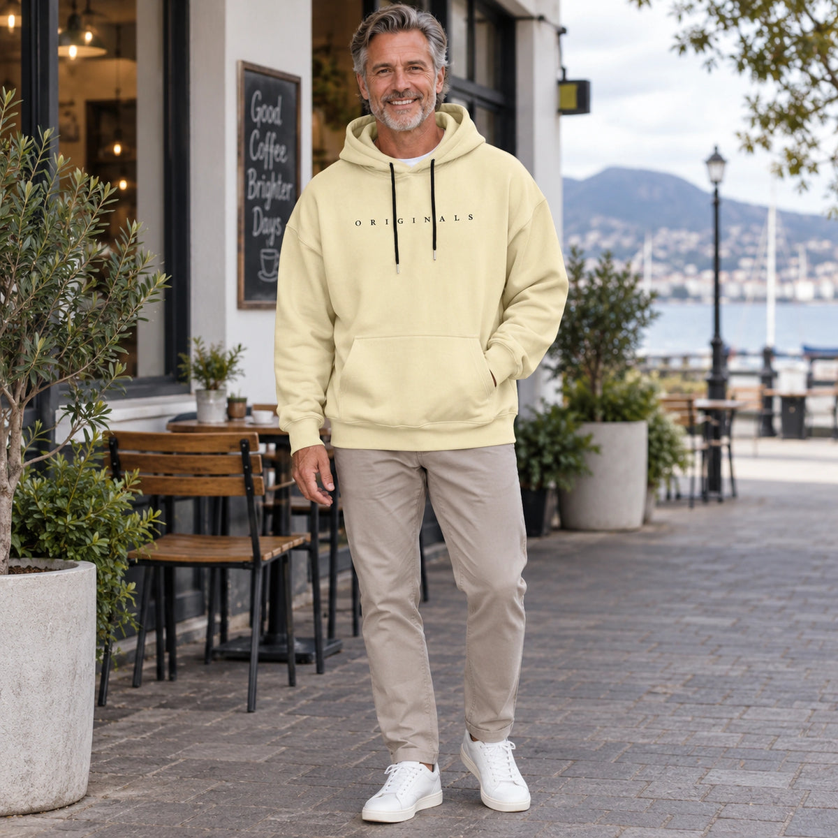 mens hoodie — Noah Yellow hoodie photo on a mature male model at an Australian cafe — view 8