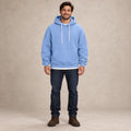 mens hoodie — Men's Oversized Kangaroo Pocket Hoodie — Matteo, Light Blue, complete front view, worn by an adult model