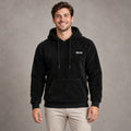 mens hoodie — Black Paul plush fleece pullover hoodie, complete front view on young model in warm neutral