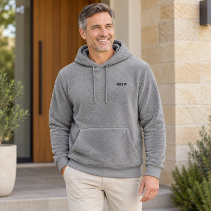 mens hoodie — Gray Paul plush fleece pullover hoodie, three quarter front view on mature model — view 4