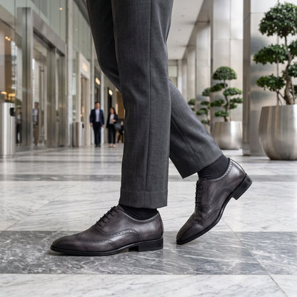 Close up view showing the premium genuine cowhide leather and intricate stitching details of Classic Oxford Loafers — view 8