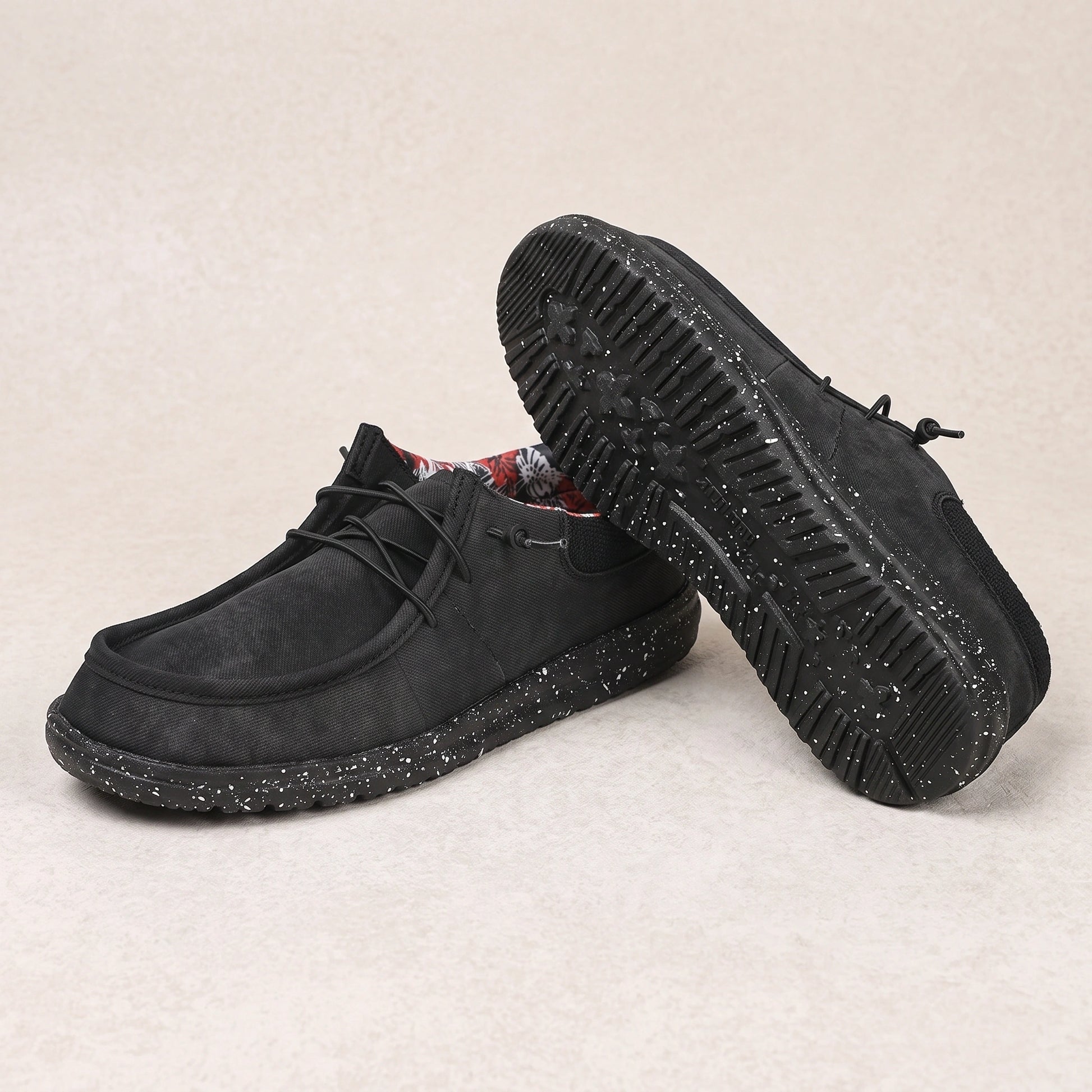 Close up view of the lightweight breathable Oxford loafers showing fine stitching and textured fabric, emphasizing their
