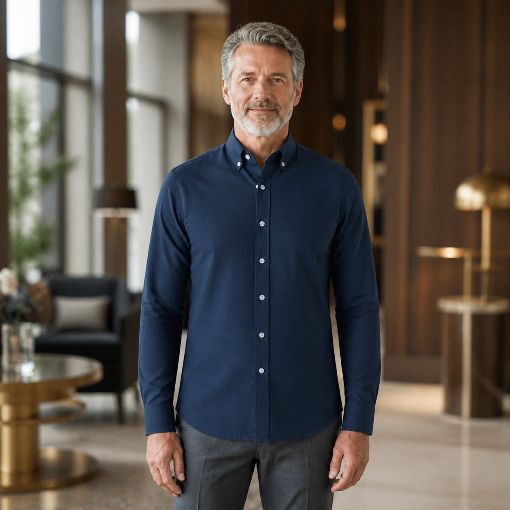 Mature man wearing Navy smart casual long sleeve Oxford shirt, full front view with button down collar, cuffs, and — view 5