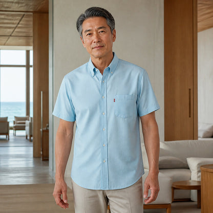 Mature man wearing Aqua classic fit short sleeve Oxford shirt, full front view with button down collar, chest — view 7