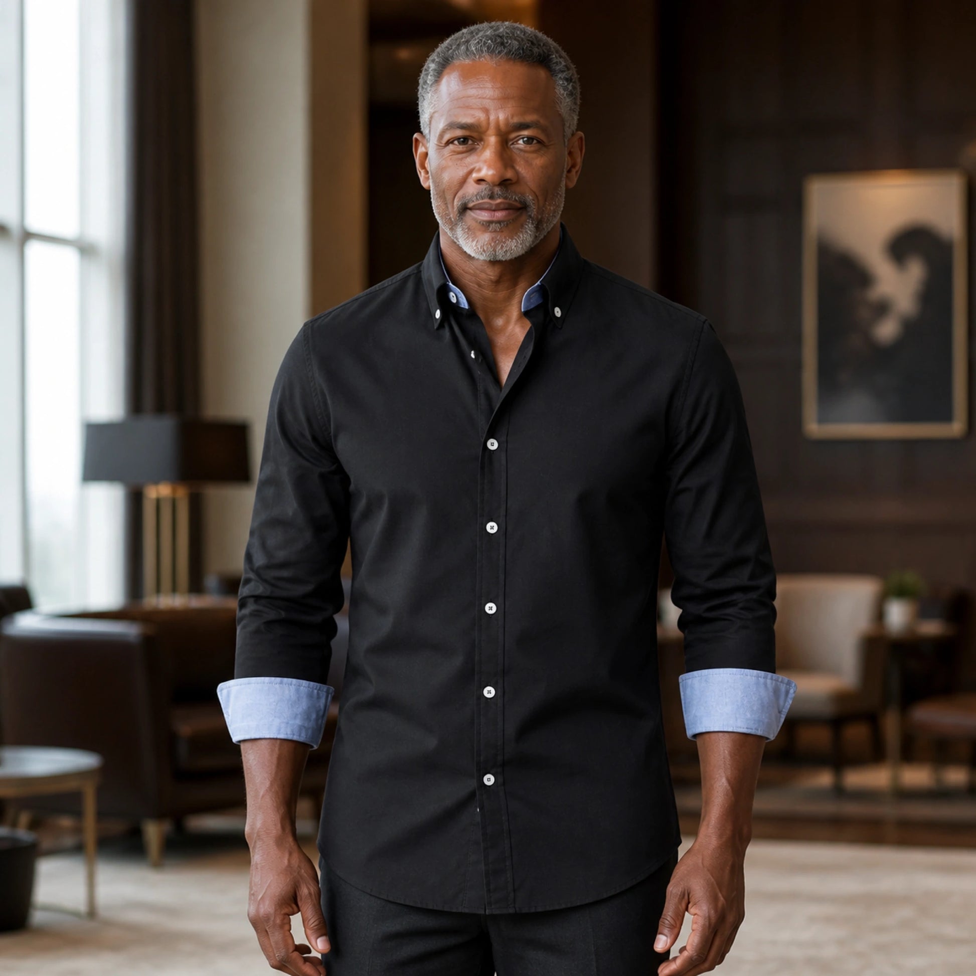 Professional mature man wearing the exact comfortable Oxford shirt