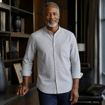 Mature man wearing the gray slim fit cotton Oxford shirt, full front view with stand collar, chest pocket, rolled — view 3