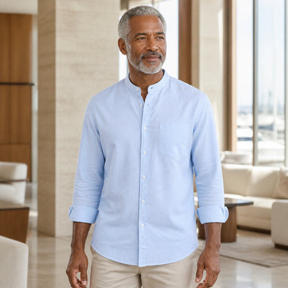 Mature man wearing the sky blue slim fit cotton Oxford shirt, full front view with stand collar, chest pocket — view 4
